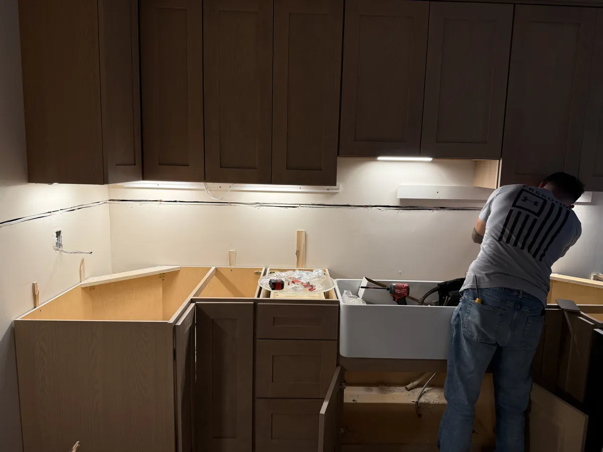 Under-cabinet lighting installed during a kitchen renovation